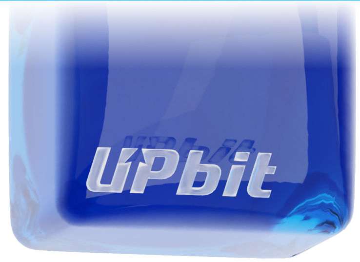 Glass Upbit-branded bottle suspended above the section